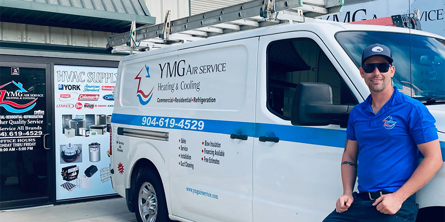 YMG service technician by van